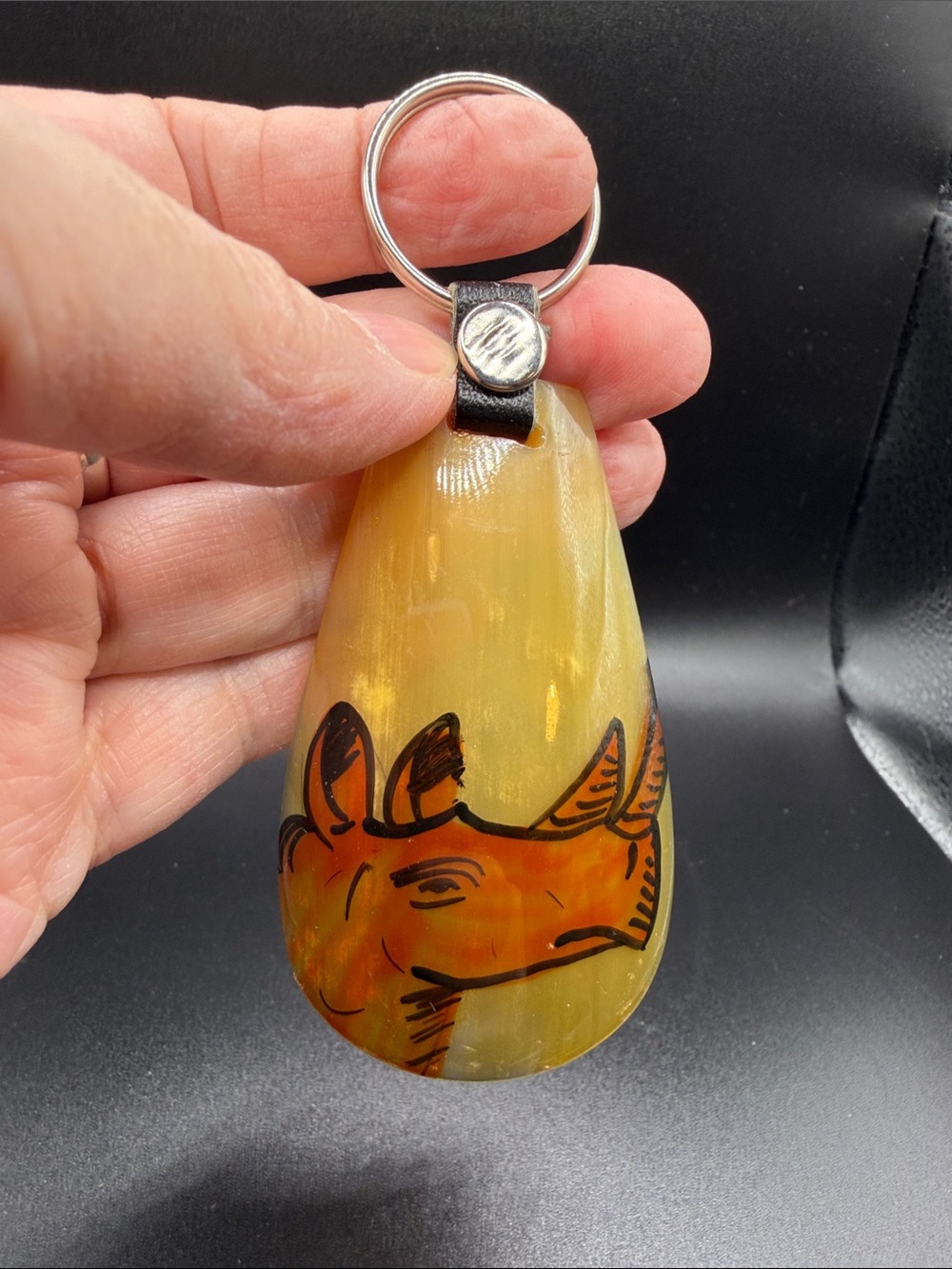 Handmade keychain from Kenya with hand-painted rhino head